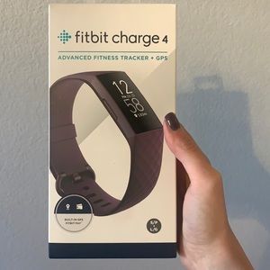 Brand new Fitbit Charge 4 in Rosewood. Two band sizes - small and large.
